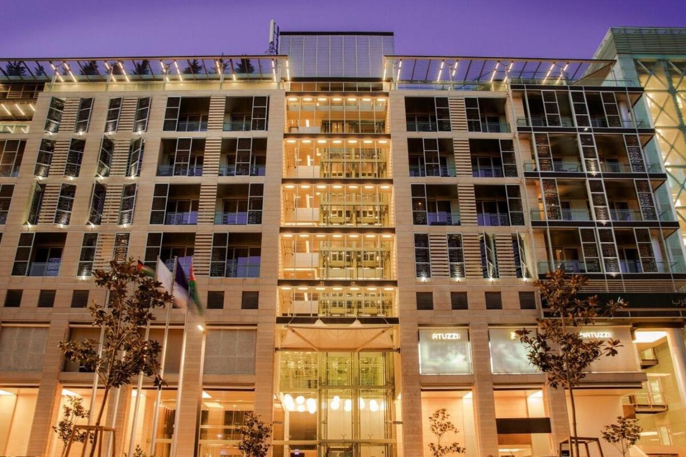The Abdali Boulevard Hotel Amman Bagian luar foto The hotel at night