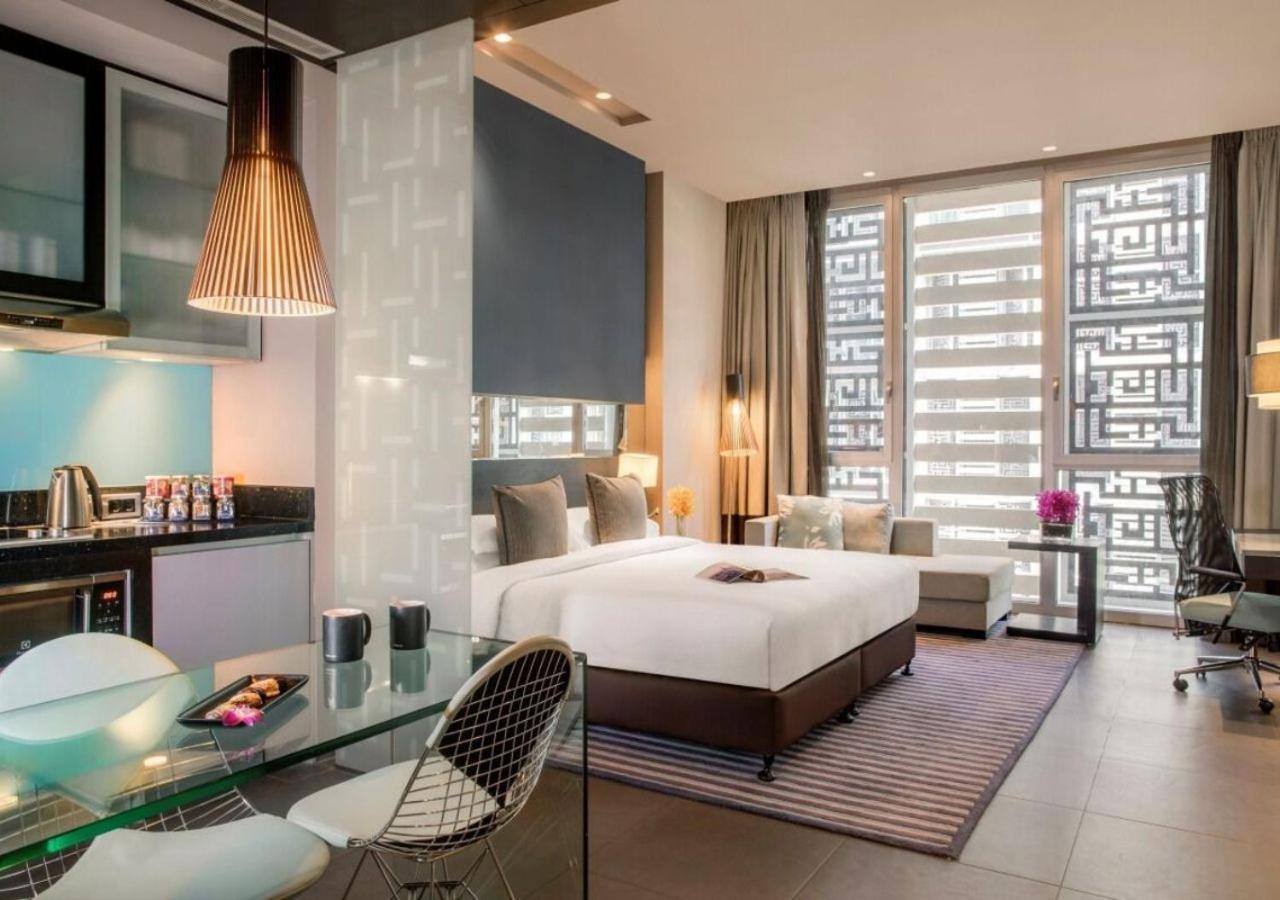 The Abdali Boulevard Hotel Amman Bagian luar foto Studio
