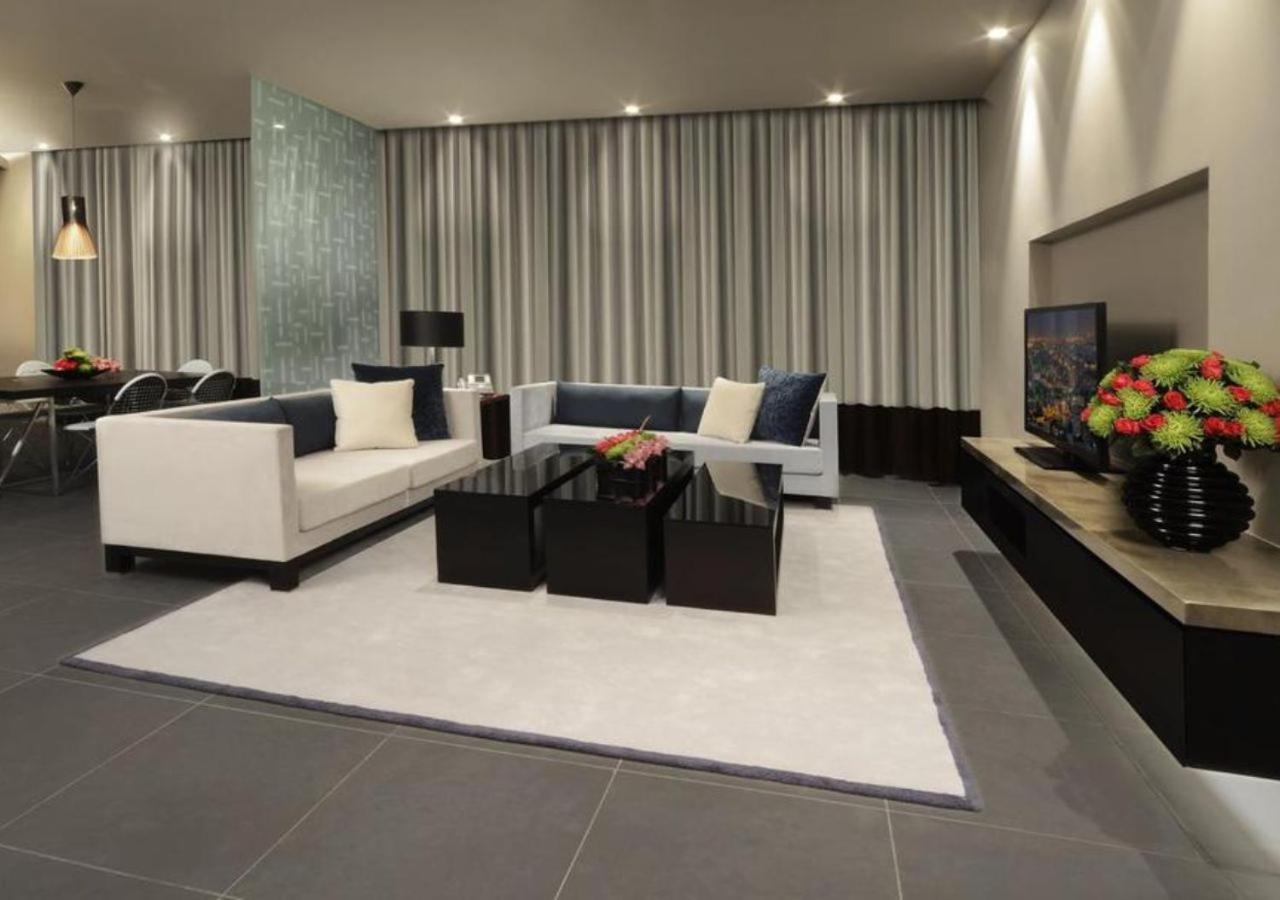 The Abdali Boulevard Hotel Amman Bagian luar foto A living room